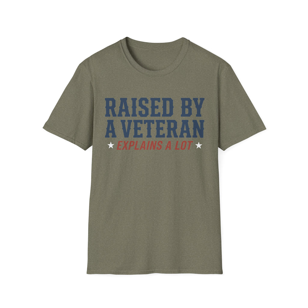 Military green crewneck T-shirt with 'RAISED BY A VETERAN' and 'EXPLAINS A LOT' graphic