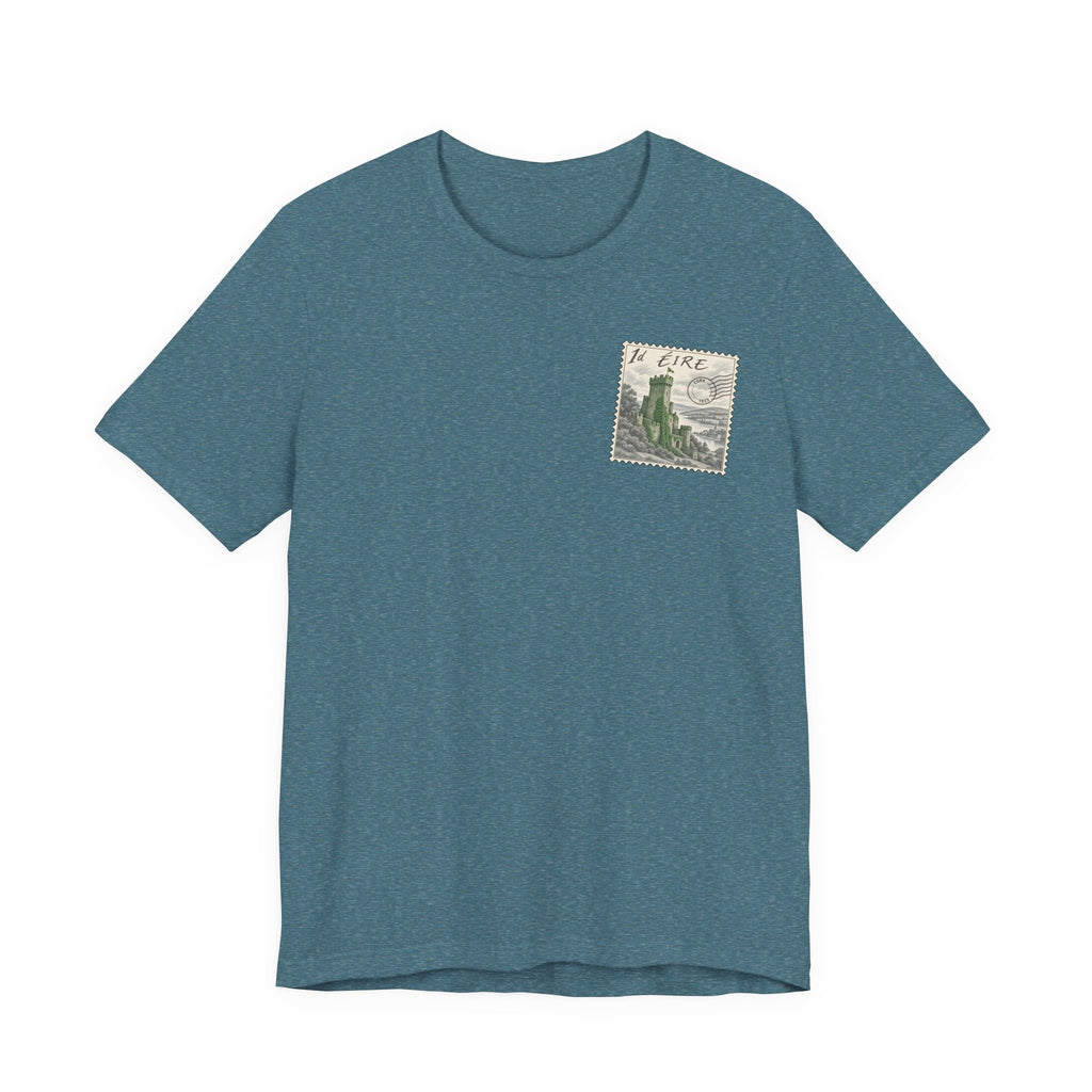 Blue travel t-shirt with small vintage postage-stamp castle graphic on chest