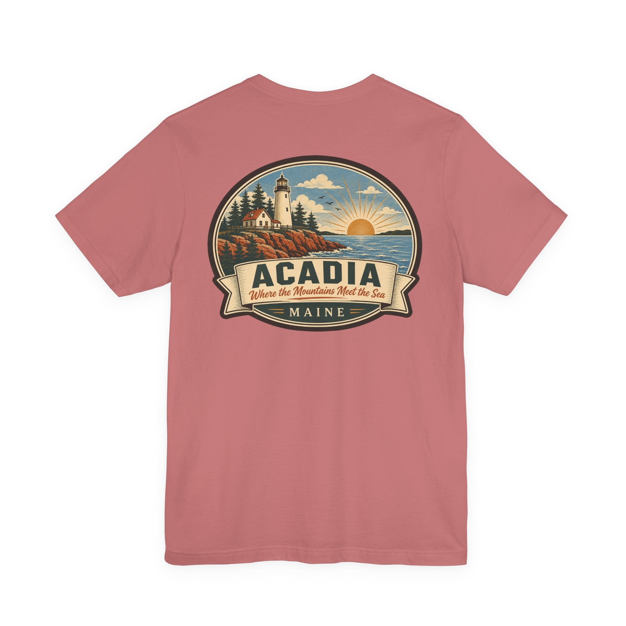 Dusty rose crew-neck T-shirt with centered Acadia lighthouse graphic badge