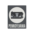 Pennsylvania metal wall sign, dark gray square with Liberty Bell graphic and 'PENNSYLVANIA' text