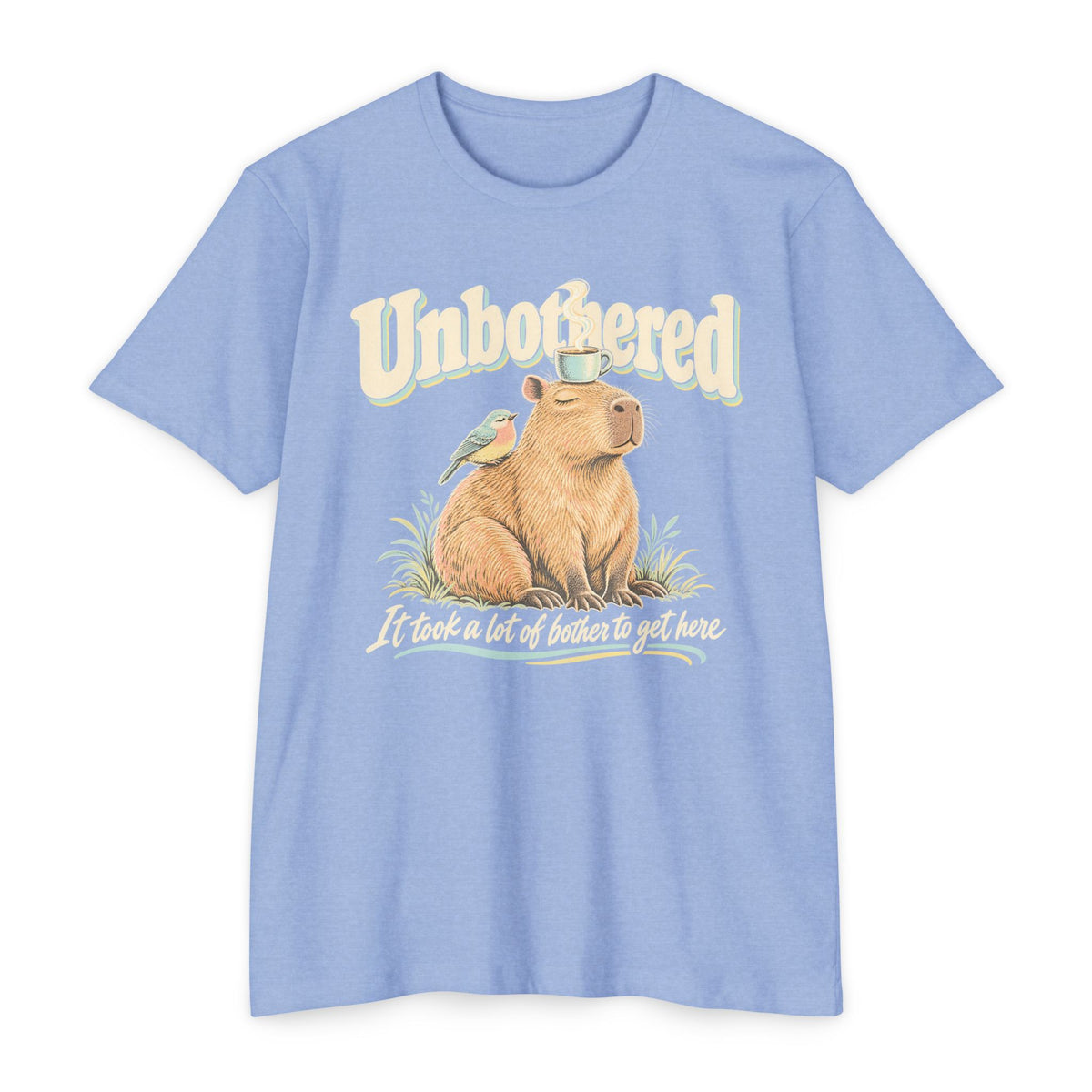 Light blue T-shirt with unbothered capybara holding a coffee cup graphic