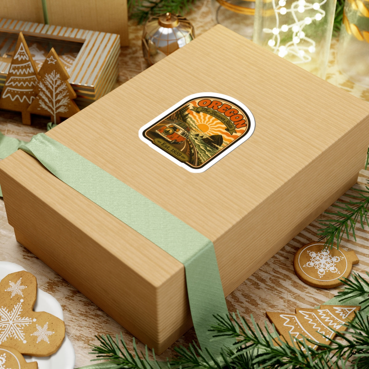 Oregon travel sticker on a wrapped gift box, with vintage van and sunburst design