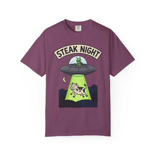 Purple T-shirt with “Steak Night” alien and cow graphic