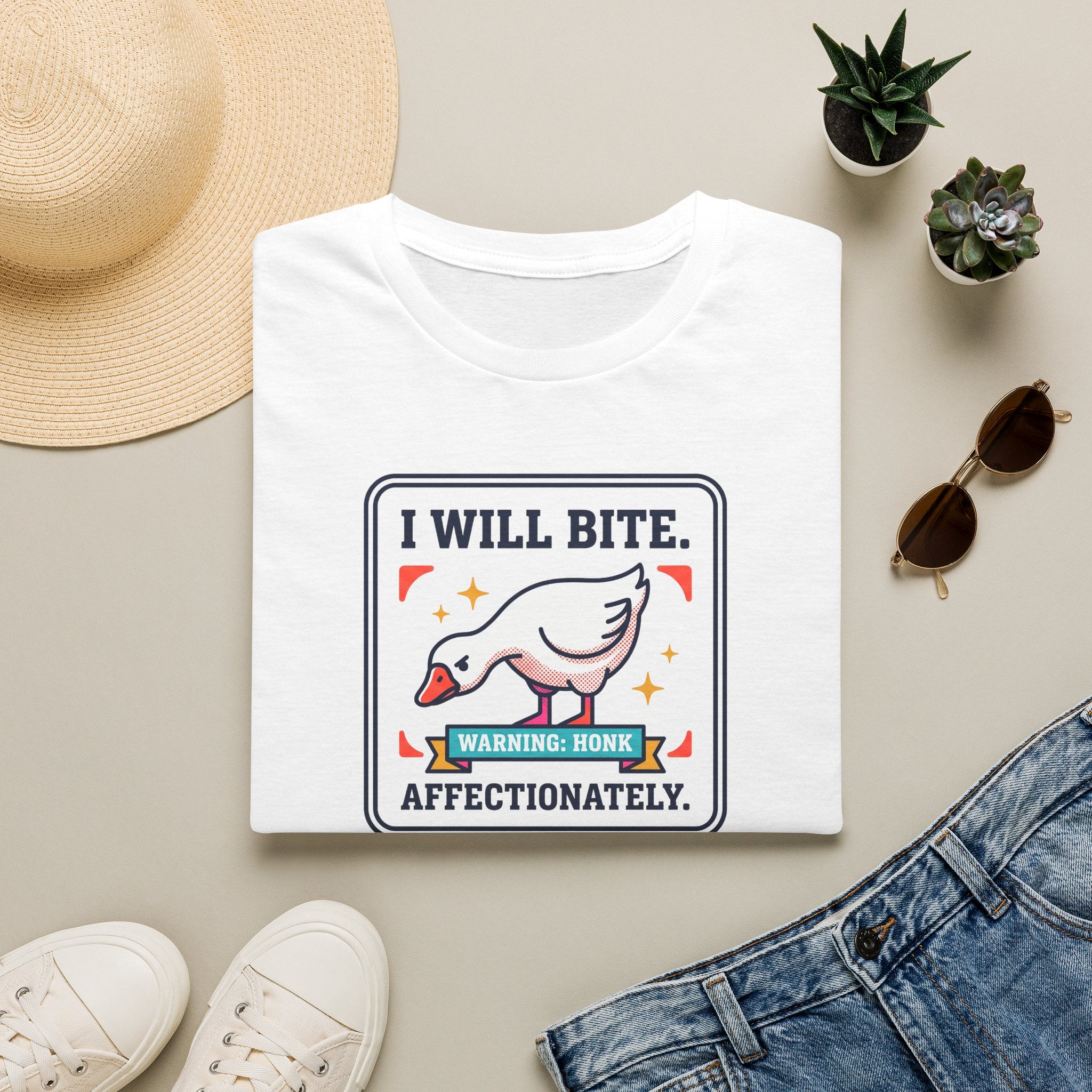 White T-shirt with front graphic: I WILL BITE warning goose