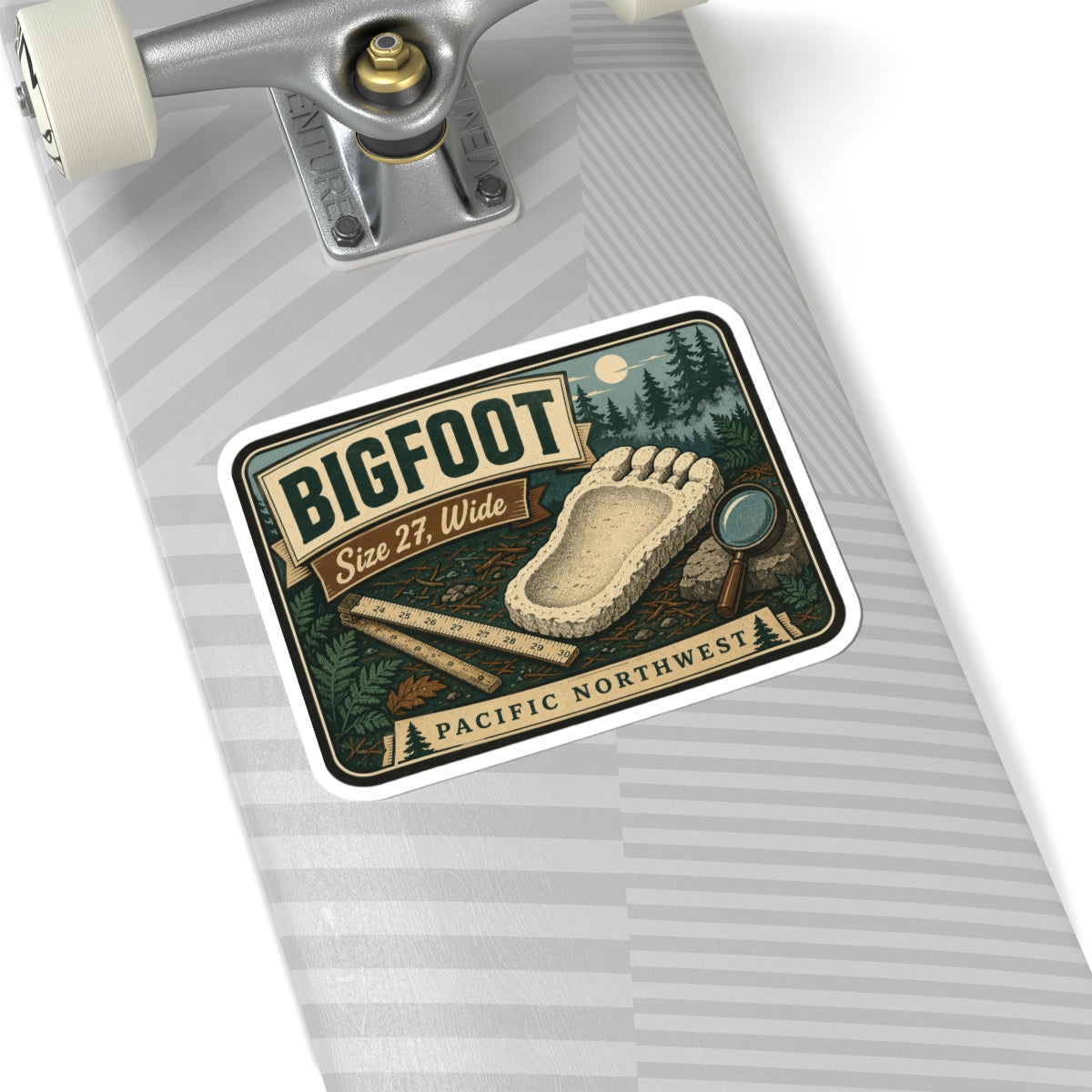 Bigfoot footprint sticker with Pacific Northwest banner, footprint graphic and magnifying glass