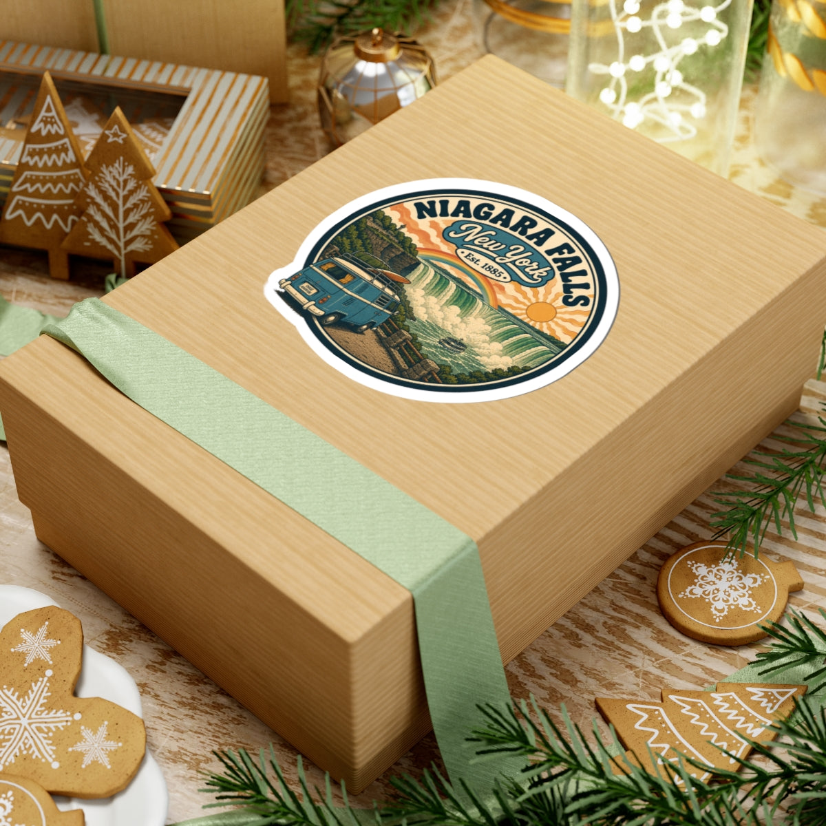 Round white kiss-cut sticker on wrapped gift with Niagara Falls New York vintage camper van scene