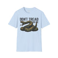 Light blue T-shirt featuring coiled rattlesnake graphic and "DON’T TREAD ON ME" text