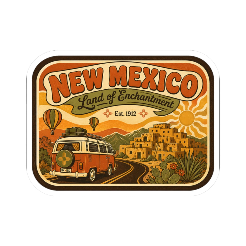 Die-cut New Mexico sticker showing vintage camper on winding road with desert town and cacti
