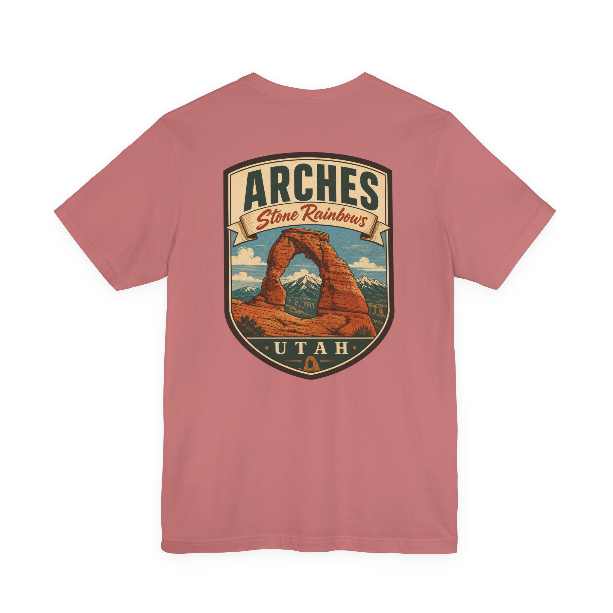Dusty rose t-shirt with large Arches Utah shield graphic on the chest