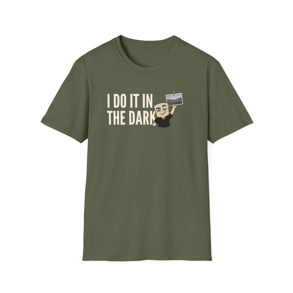 Olive green T-shirt with “I DO IT IN THE DARK” camera graphic on chest