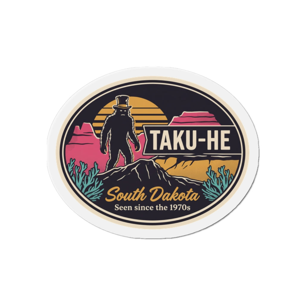 Circular die-cut magnet badge with black Sasquatch and TAKU-HE; South Dakota text