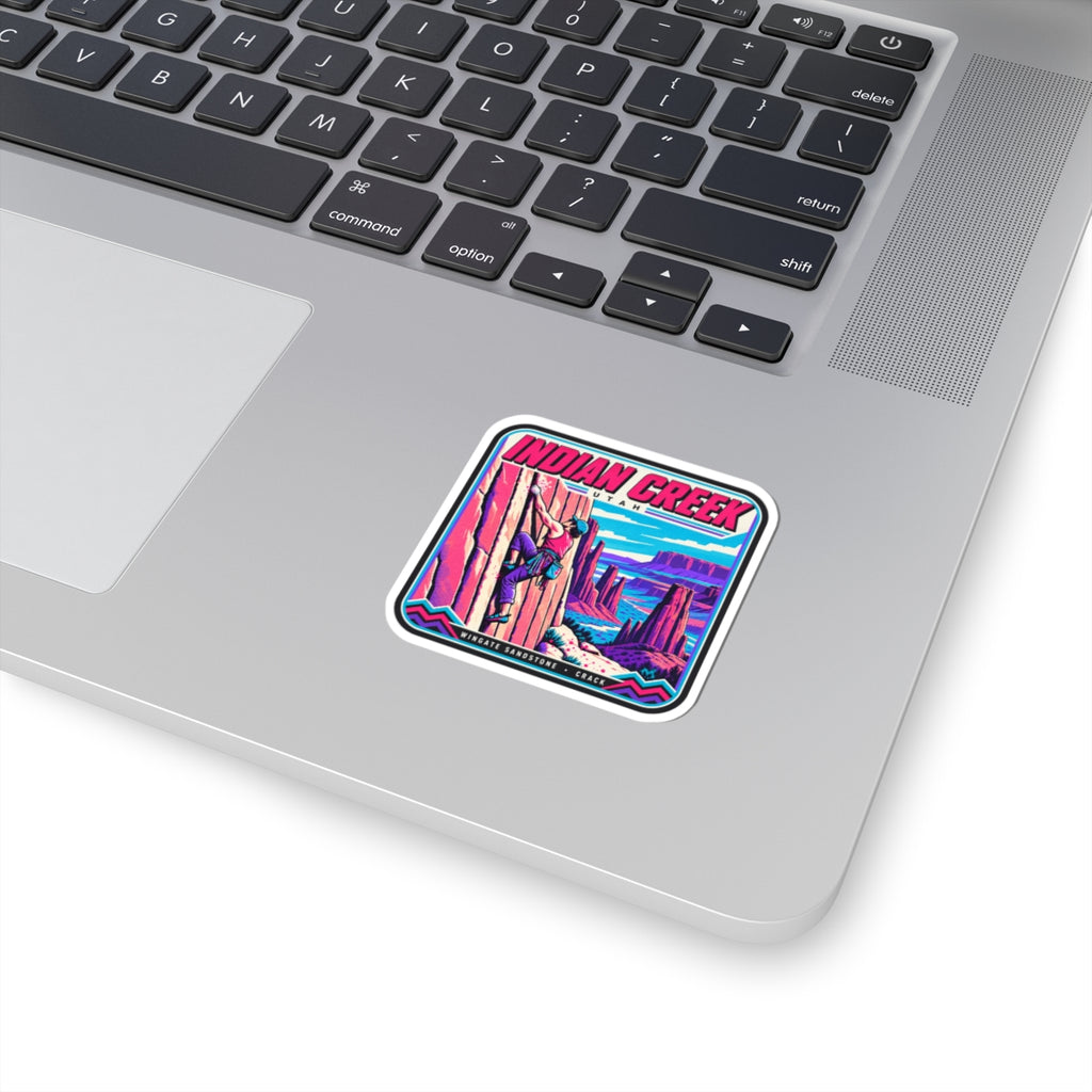 Colorful Indian Creek climber patch sticker with bold text and rock-climbing artwork.