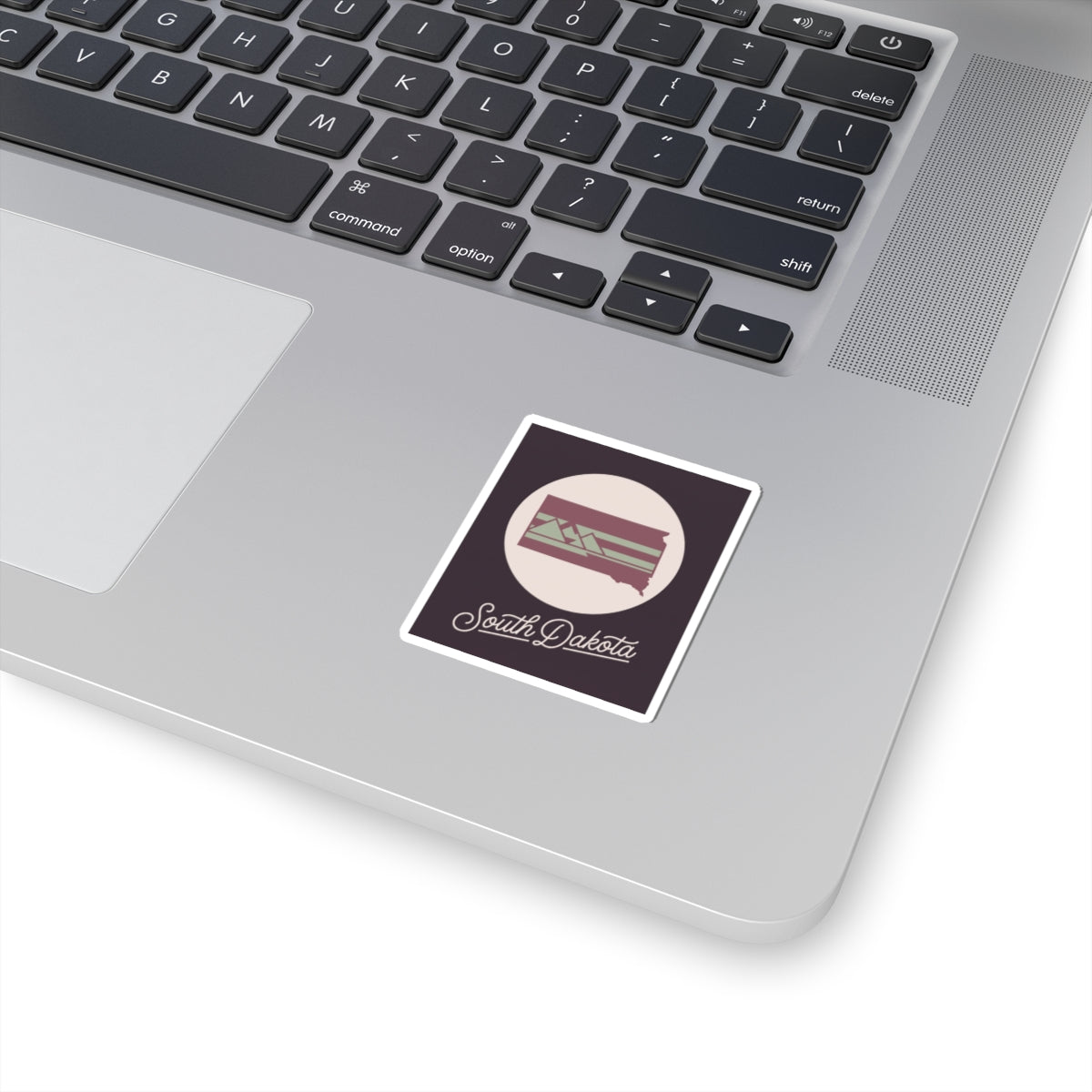 South Dakota state silhouette kiss-cut decal sticker with stylized landscape and text