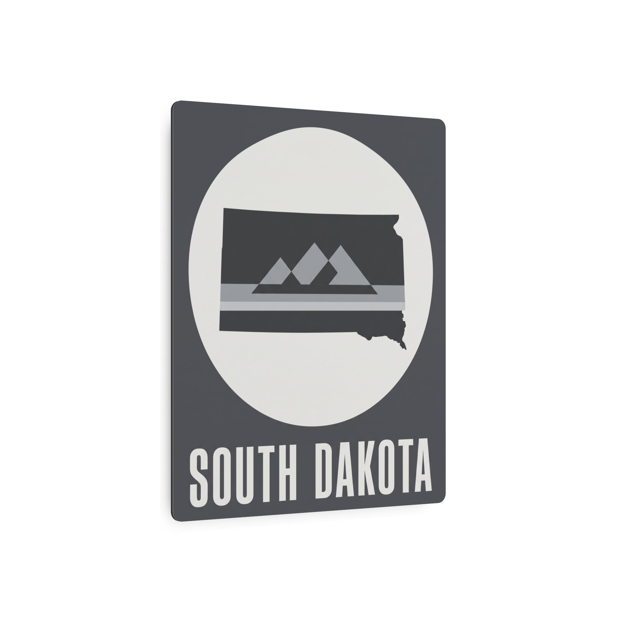 South Dakota metal wall sign, gray with oval mountain graphic and 'SOUTH DAKOTA' text