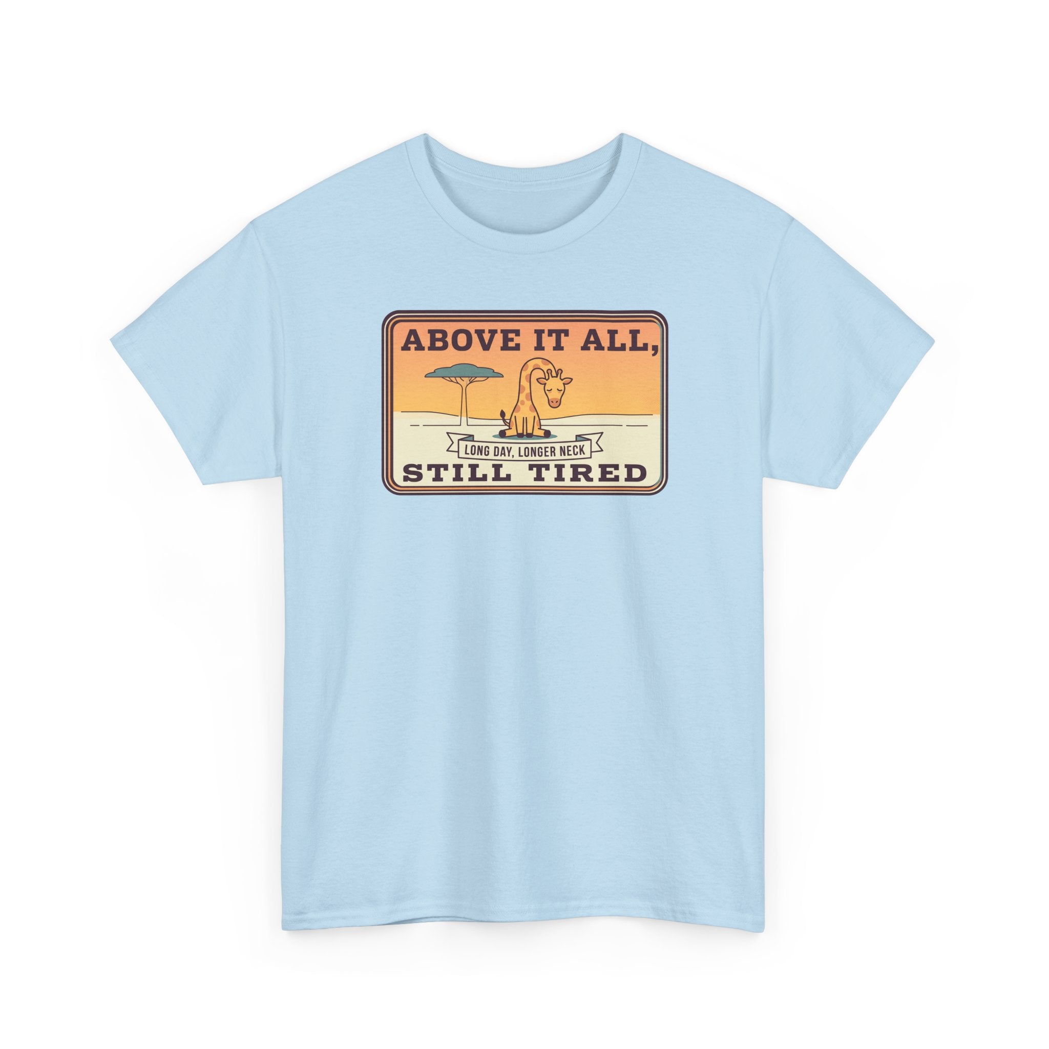 Light blue graphic T-shirt with “Above It All, Still Tired” emblem