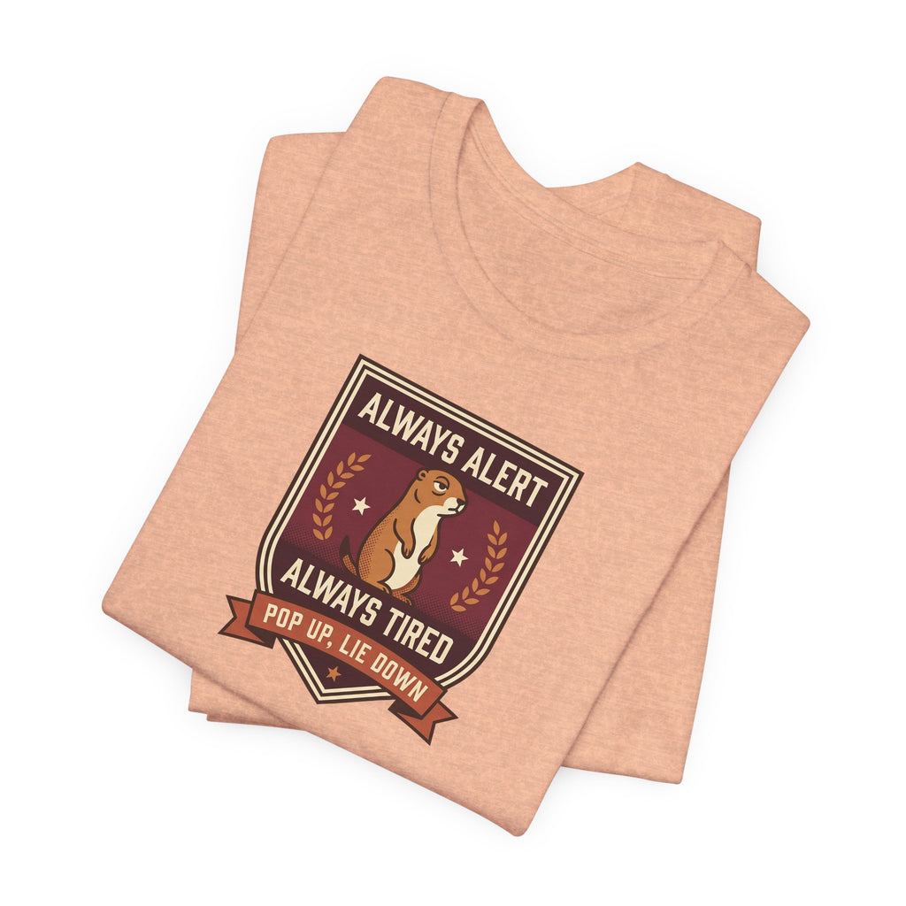 Peach squirrel crest T-shirt with badge graphic front, folded stack