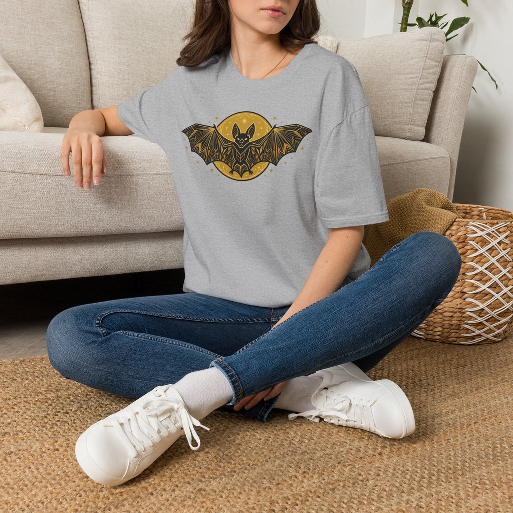 Gray crew-neck t-shirt with gold bat-and-moon graphic on the front