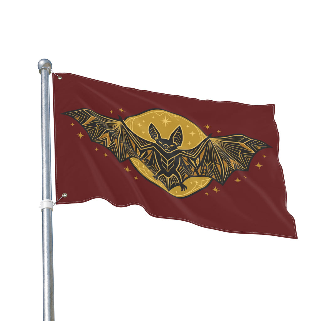 Burgundy bat moon flag on metal pole, gold bat and moon graphic