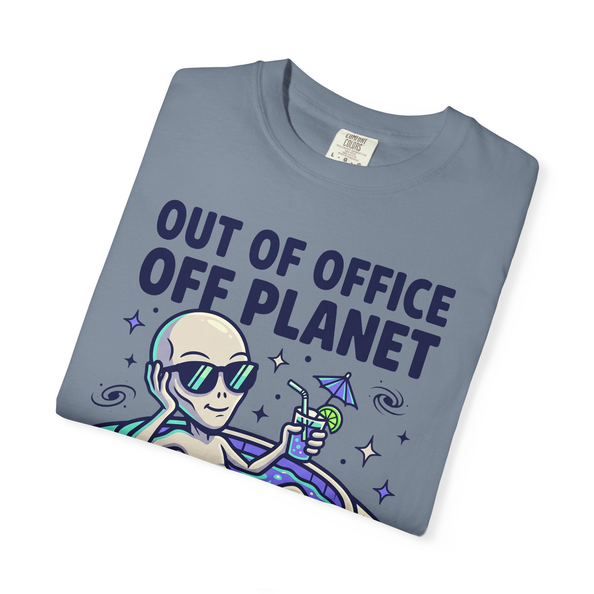 Slate gray T-shirt with “Out of Office Off Planet” alien floatie graphic on front