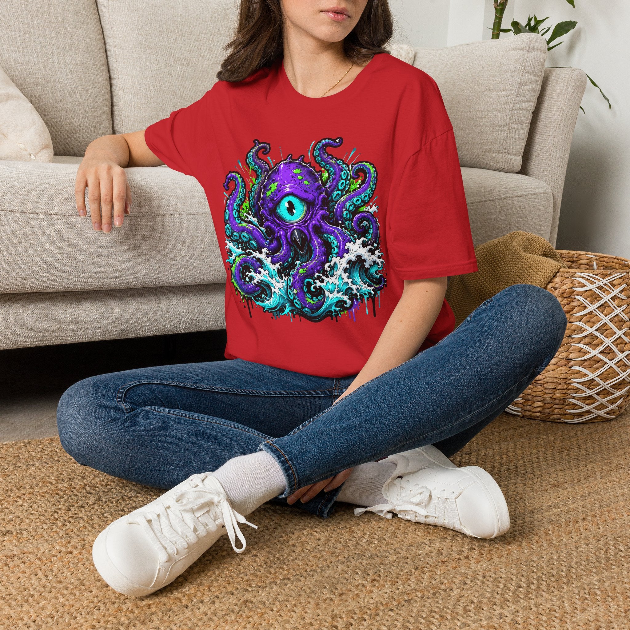 Red crew-neck T-shirt with colorful purple cyclops octopus graphic