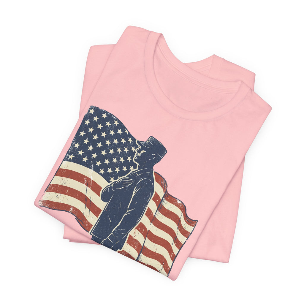 Light pink crew-neck T-shirt with saluting soldier and American flag graphic