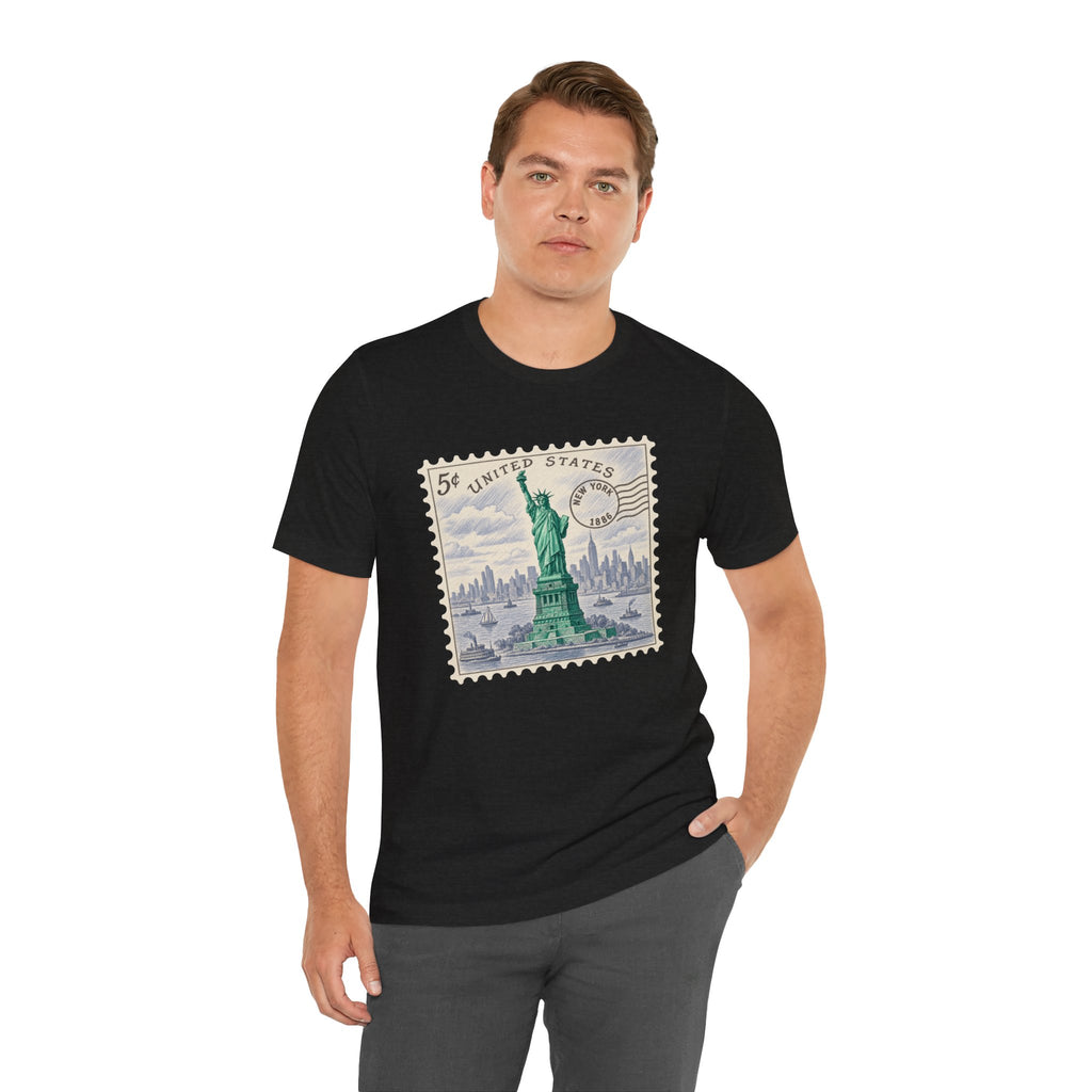 Black crew-neck T-shirt with vintage U.S. postage stamp graphic, short sleeves