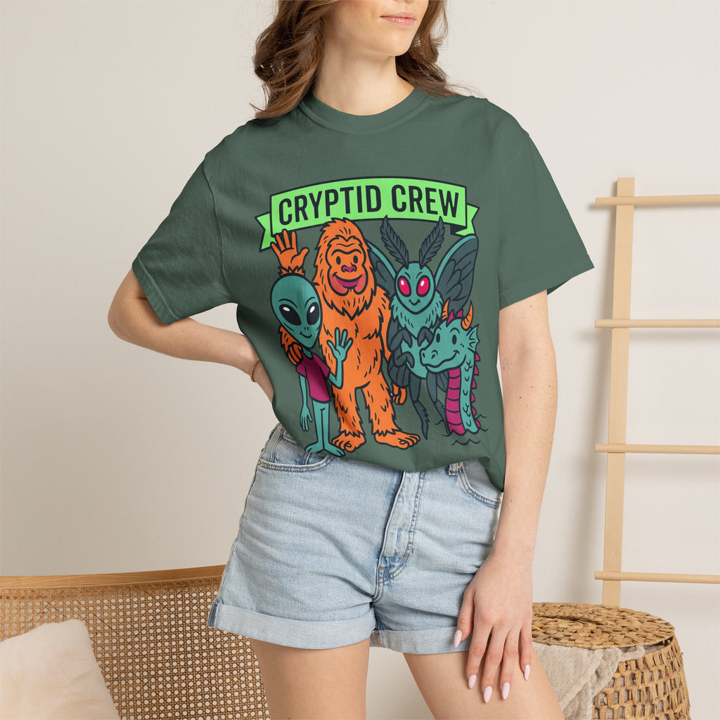 Mint green crew-neck T-shirt with 'CRYPTID CREW' graphic, short sleeves.