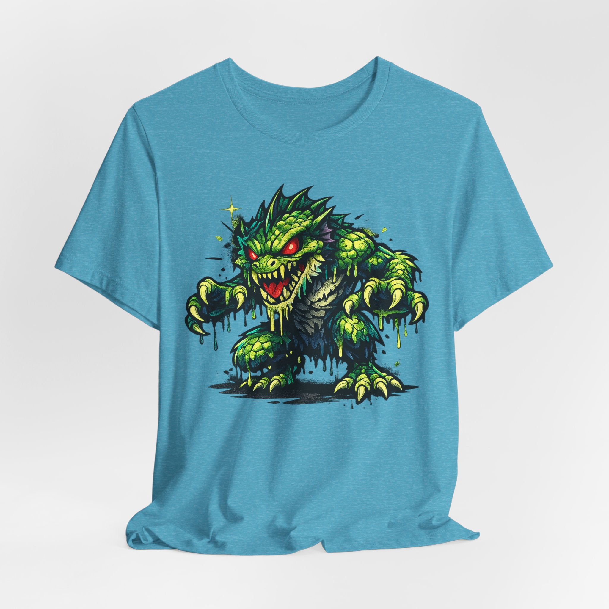 Light blue short-sleeve crewneck T-shirt with centered green monster illustration