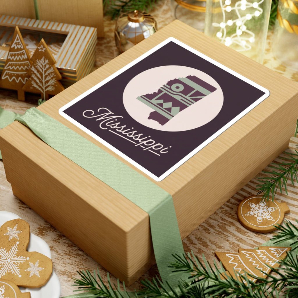 Mississippi sticker decal on wrapped gift box, square border with circular emblem and “Mississippi”