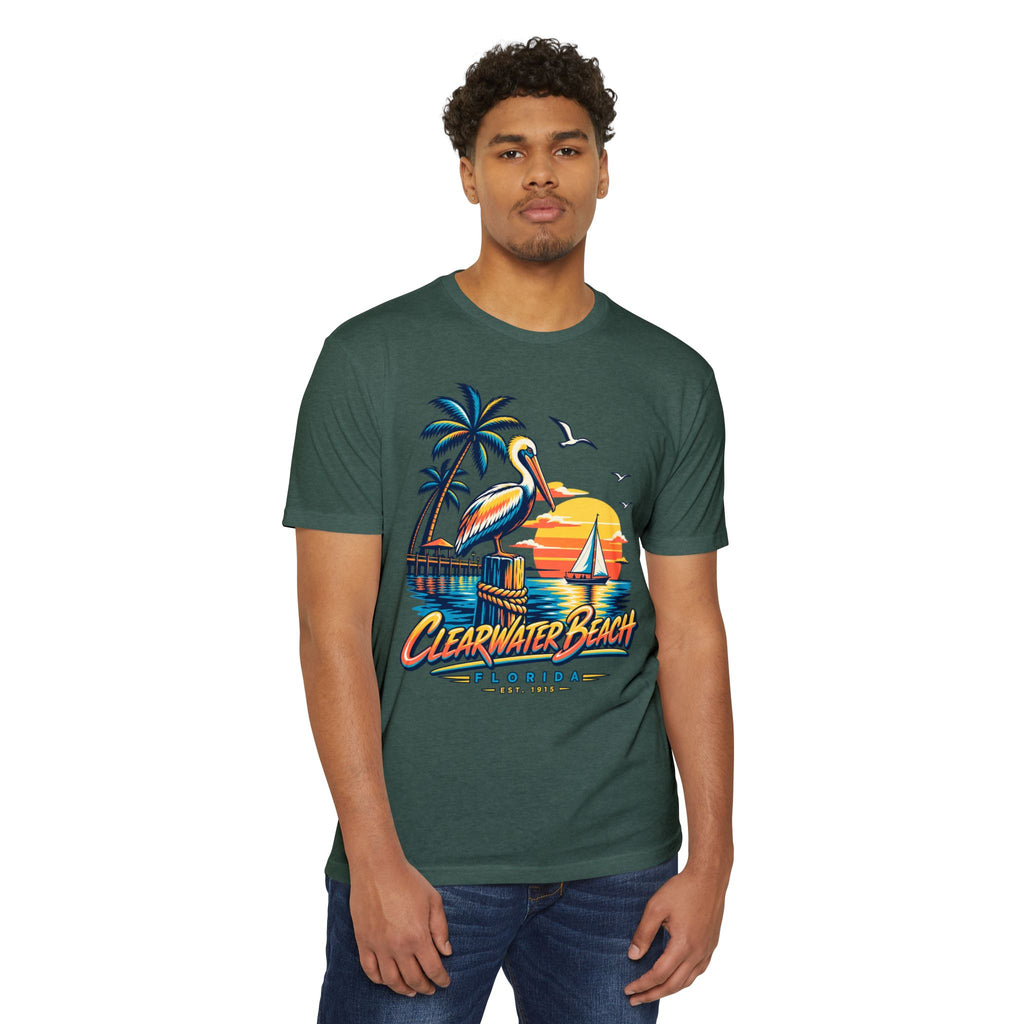 Dark green crew-neck t-shirt on model with pelican, palm, sailboat sunset Clearwater Beach graphic
