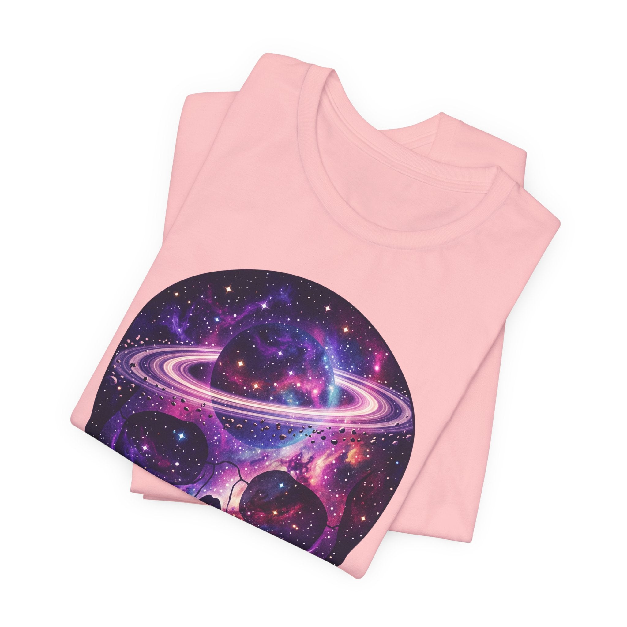 Light pink T-shirt with galaxy skull and planet swirl graphic, folded