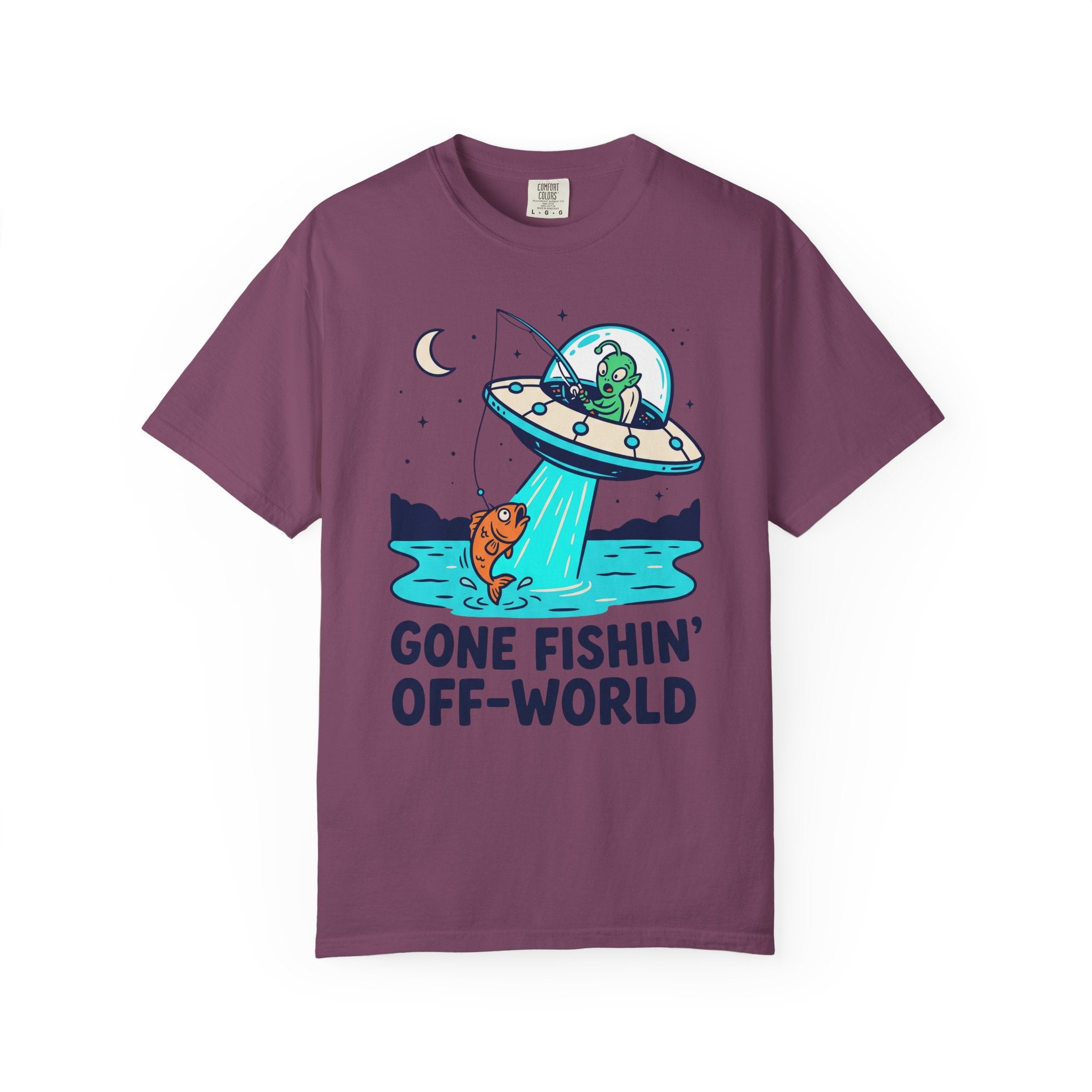Plum T-shirt with alien fishing UFO graphic and “GONE FISHIN’ OFF-WORLD”