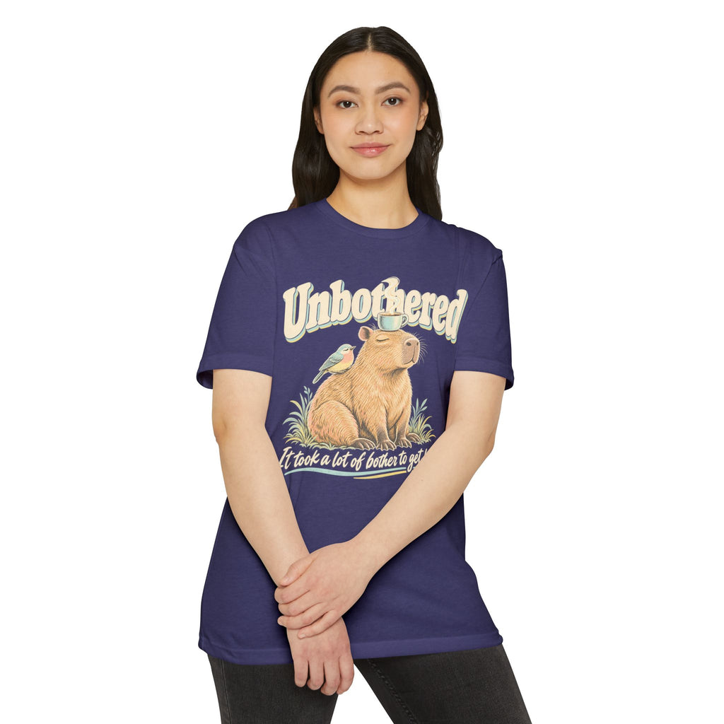 Purple crew-neck T-shirt with capybara 'Unbothered' graphic on front