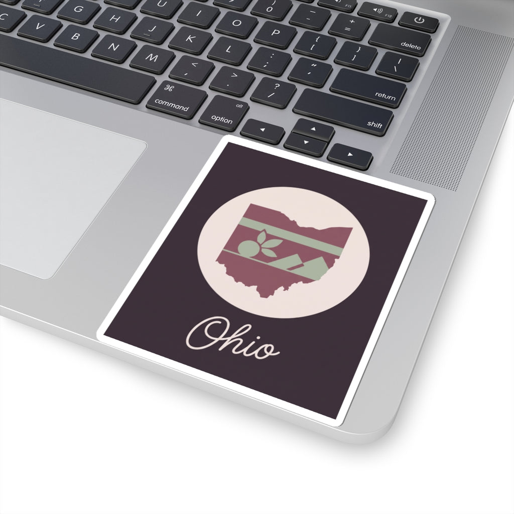 Ohio kiss-cut decal on laptop; dark square with circular floral stripe map and “Ohio”