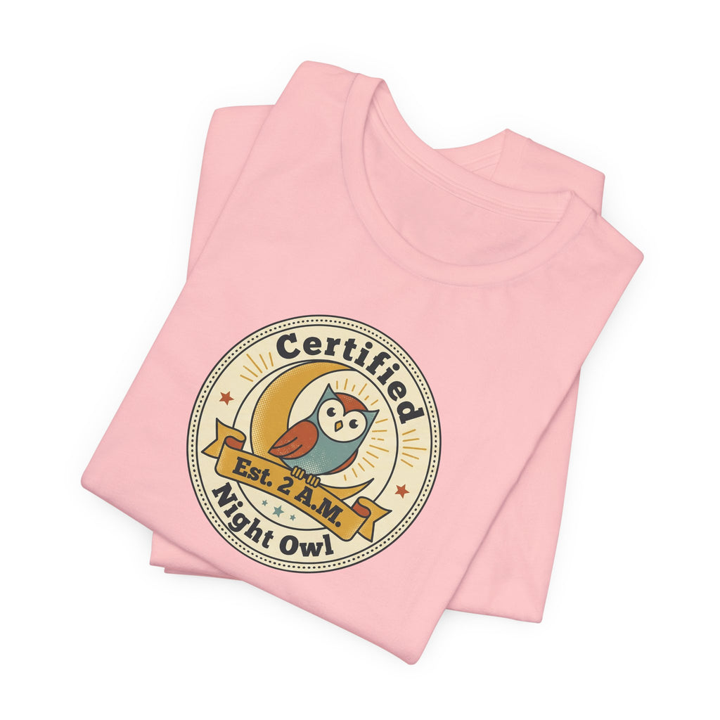 Pink T-shirt with round owl badge graphic on chest, short sleeves