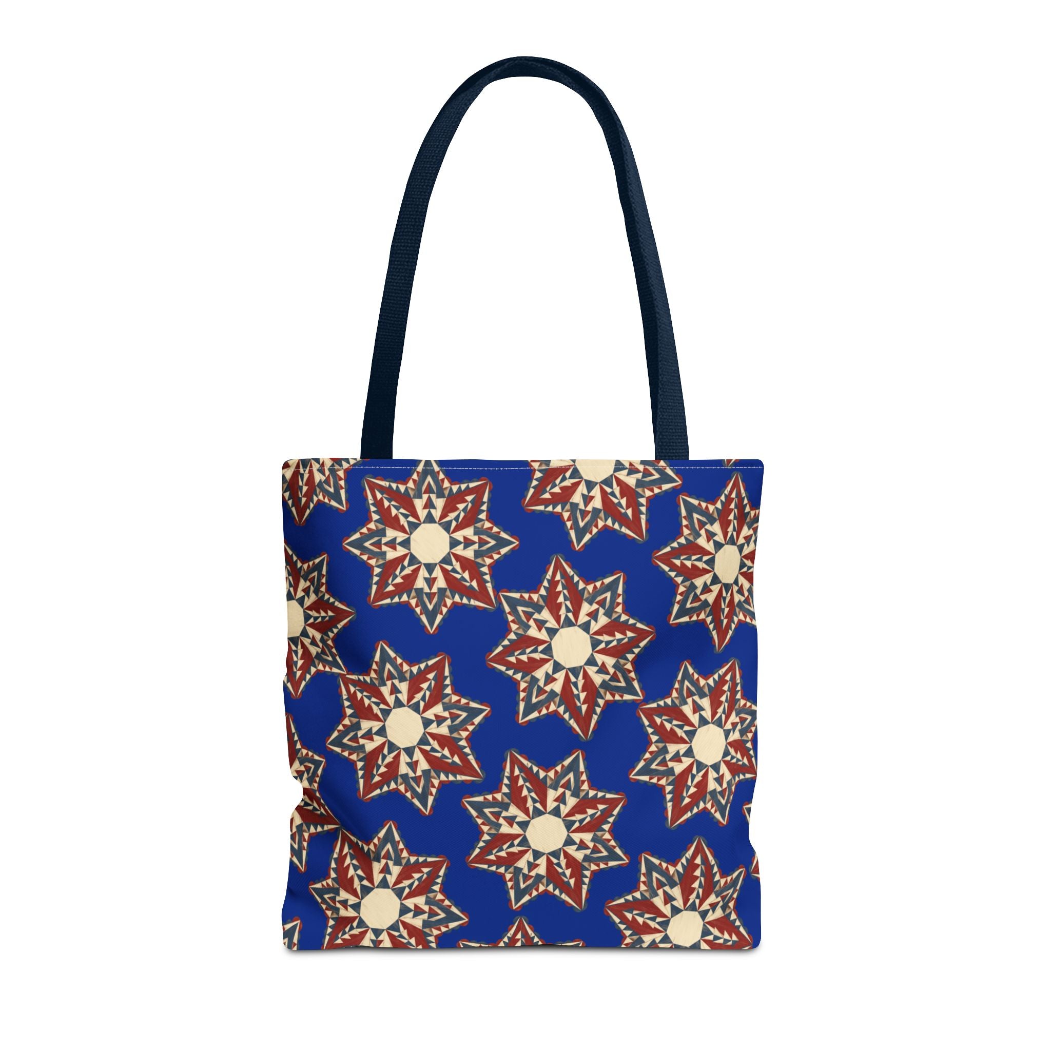 Blue tote bag with starburst floral mandala pattern and navy handles, square shape