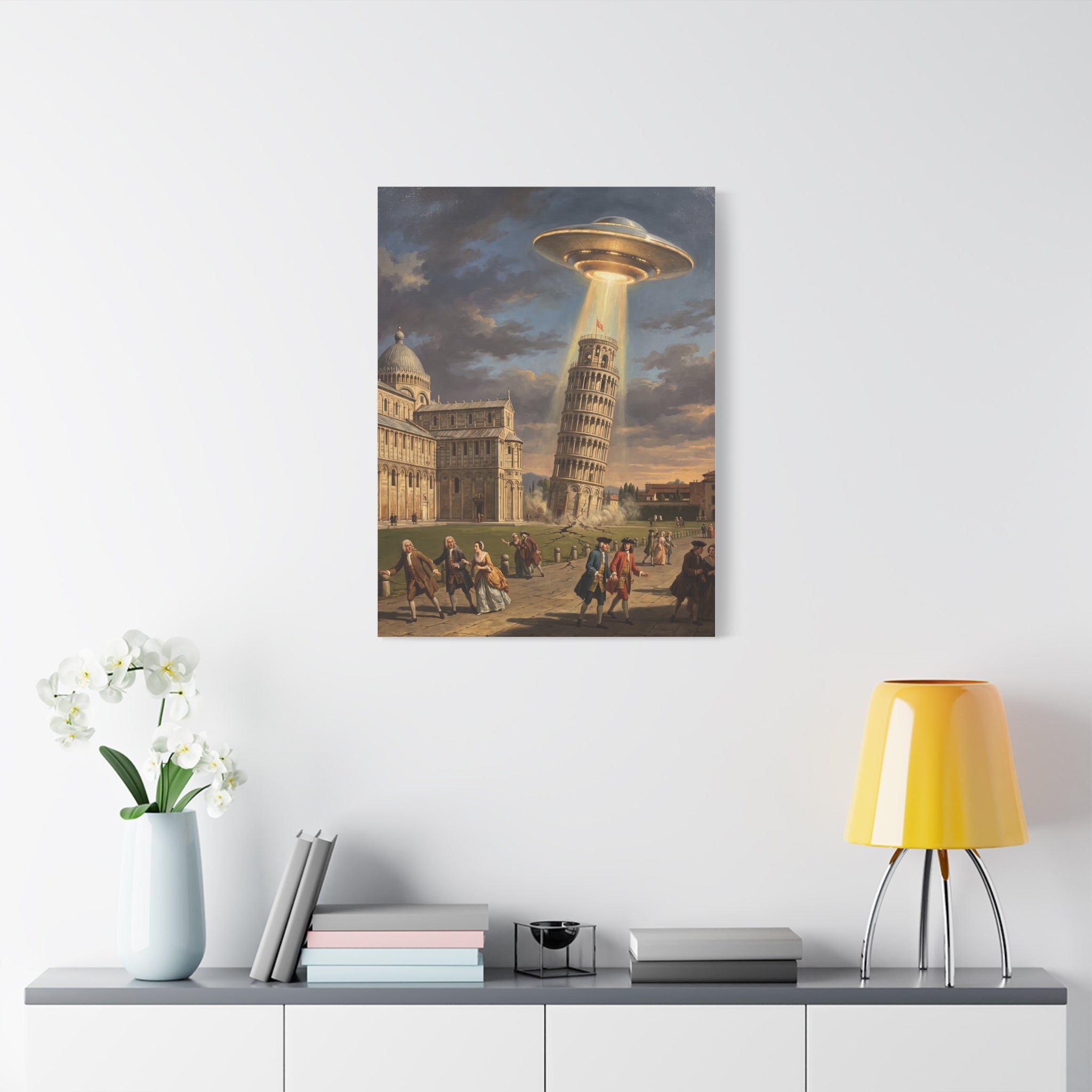 Square canvas wall art showing a UFO over the Leaning Tower with crowds moving across the plaza