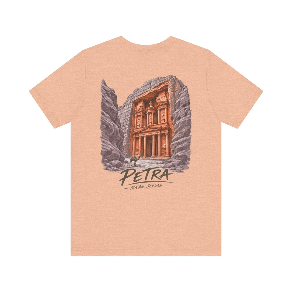 Heather peach graphic T-shirt with Petra illustration and “PEIRTA” text at center front