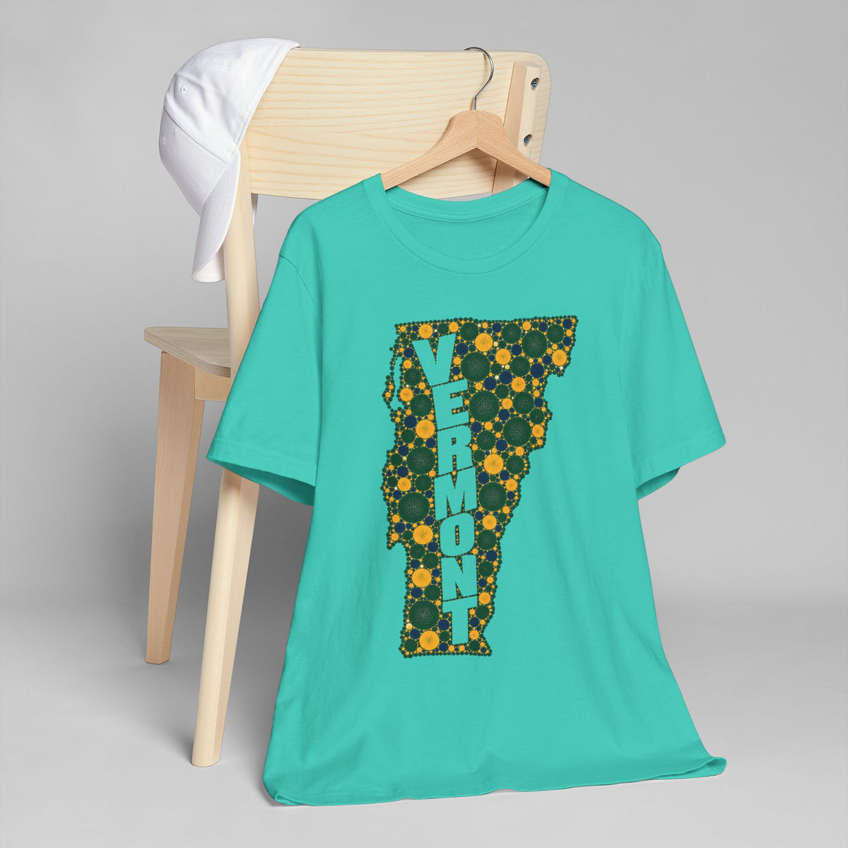 Vermont floral map graphic T-shirt, teal with green and gold Vermont outline design