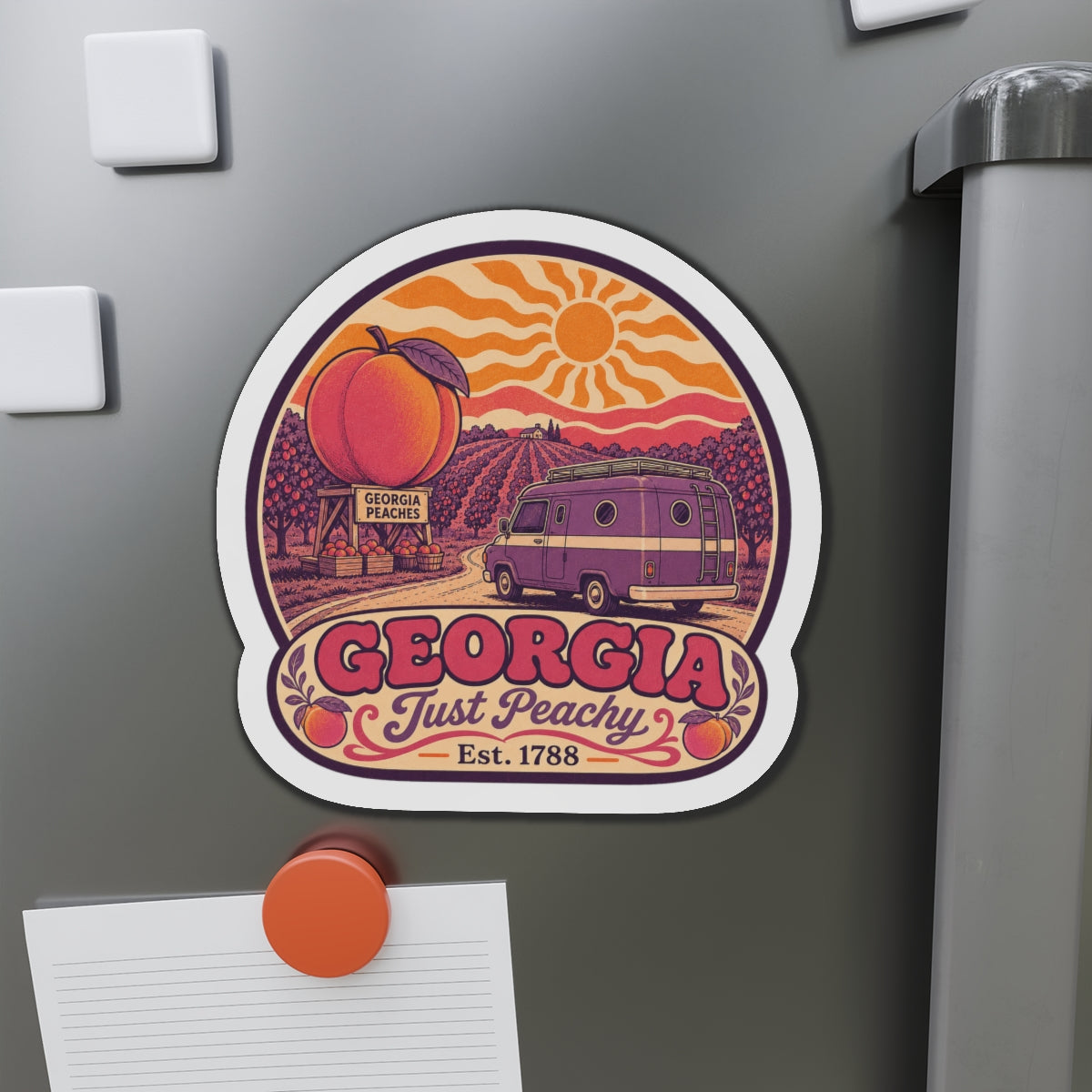 Die-cut Georgia van magnet with peach scene, sun, and “Just Peachy” title on fridge