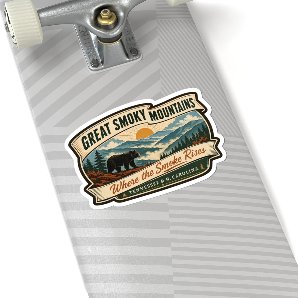 Great Smoky Mountains travel sticker on striped wrapping paper, bear-and-mountains badge; “Where the Smoke Rises”