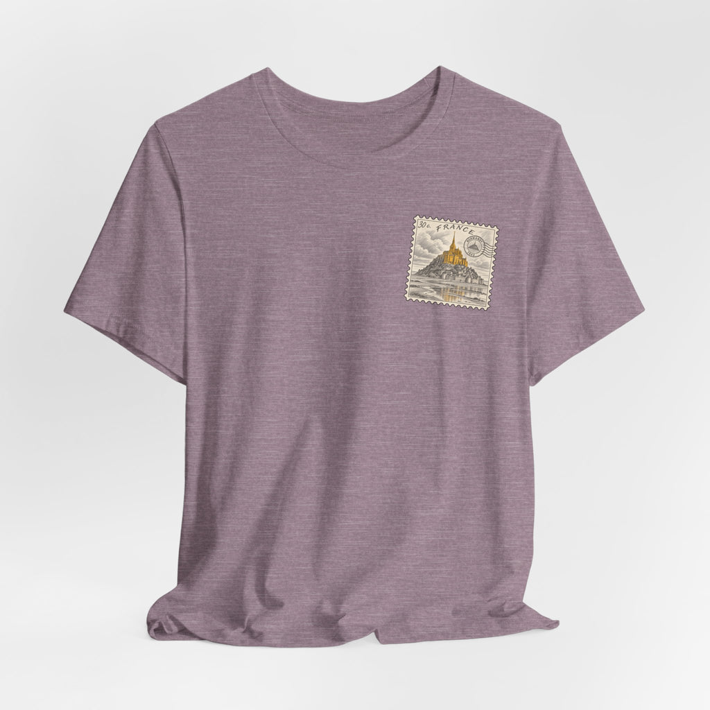 Heather mauve short-sleeve t-shirt with small vintage postage stamp graphic on chest.