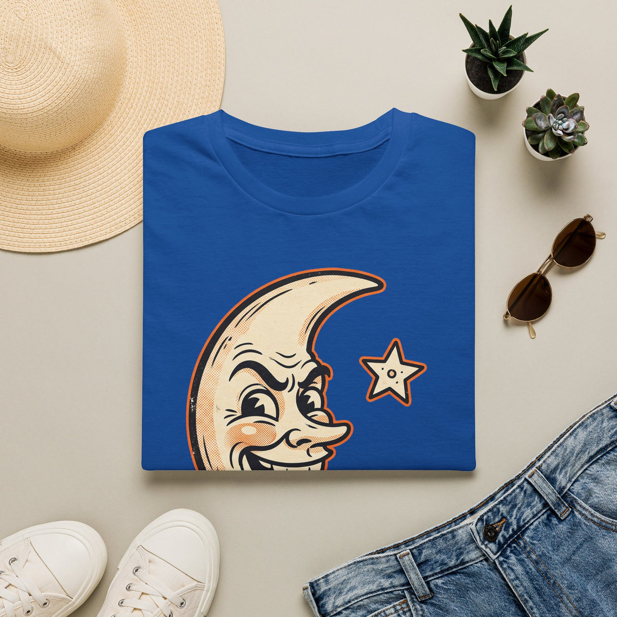 Royal blue short-sleeve crewneck T-shirt with crescent moon and star face graphic
