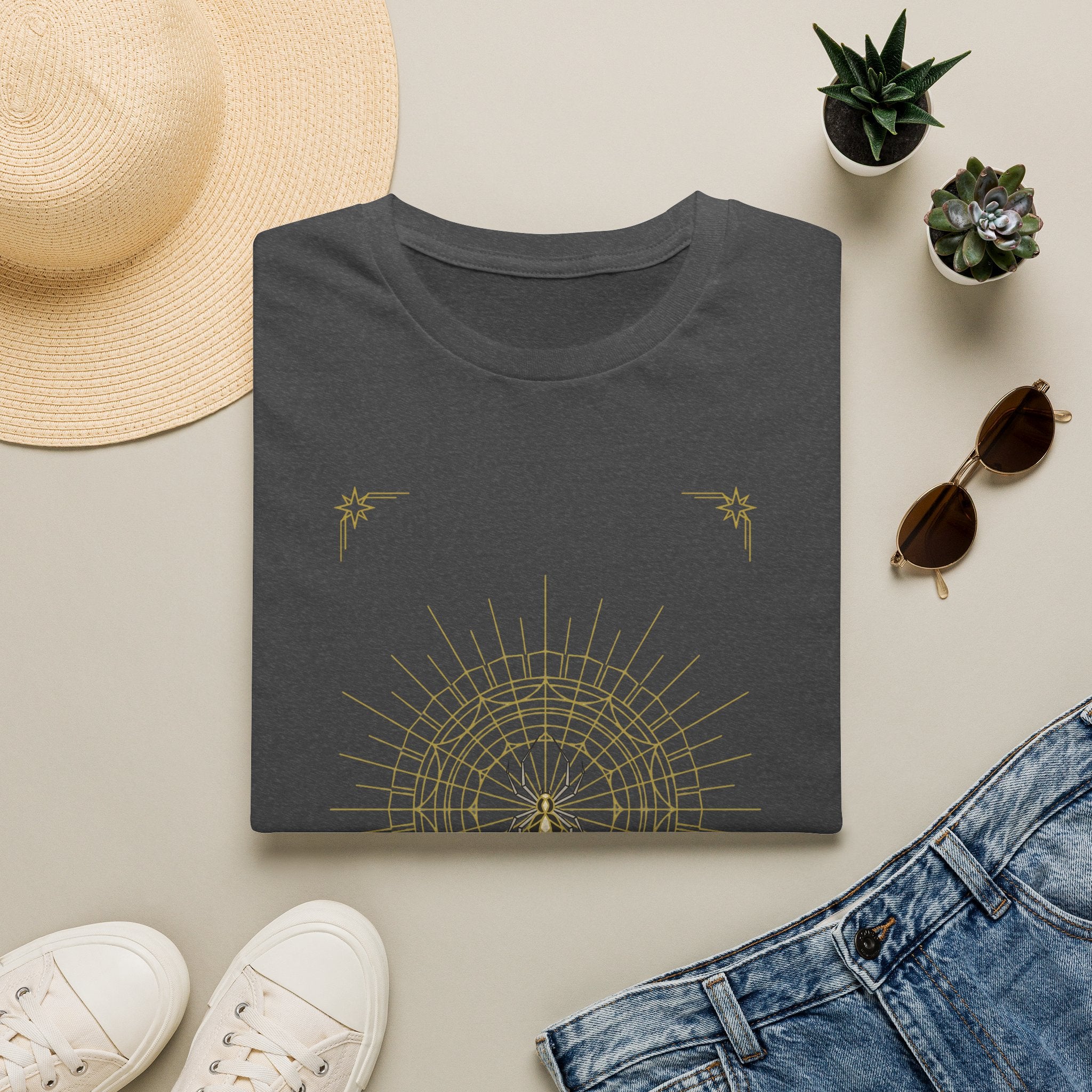Charcoal gray T-shirt with gold spider mandala web and star accents graphic