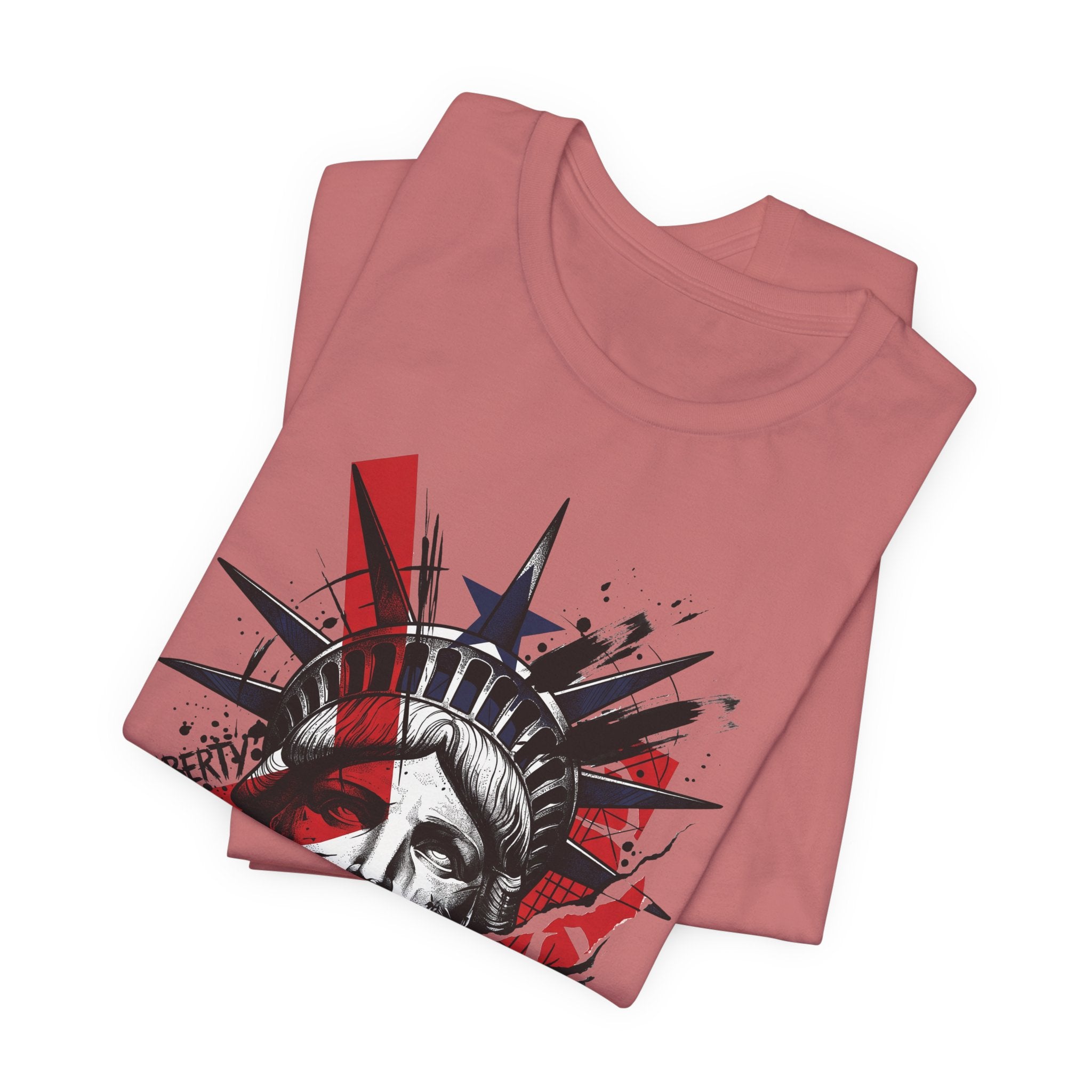 Dusty rose graphic T-shirt with red, white, and black Statue of Liberty portrait print