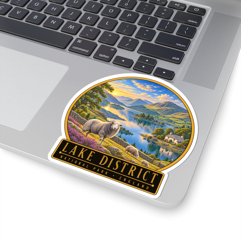 Lake District vinyl sticker on laptop lid with sheep over lake scenery and “Lake District National Park”