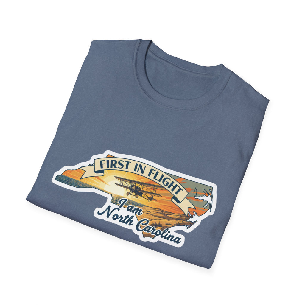 Slate blue T-shirt with 'First in Flight' airplane graphic and North Carolina text