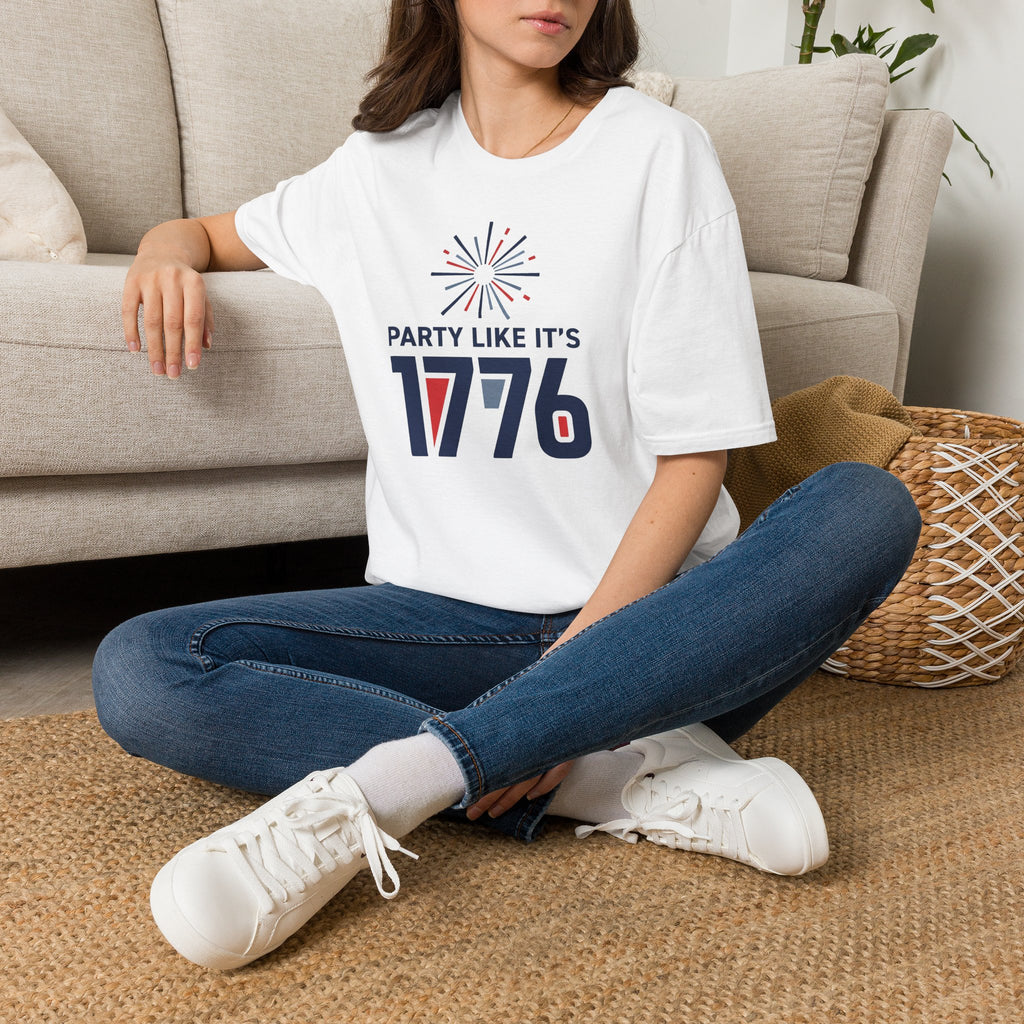 White T-shirt with fireworks graphic and text “PARTY LIKE IT’S 1776”