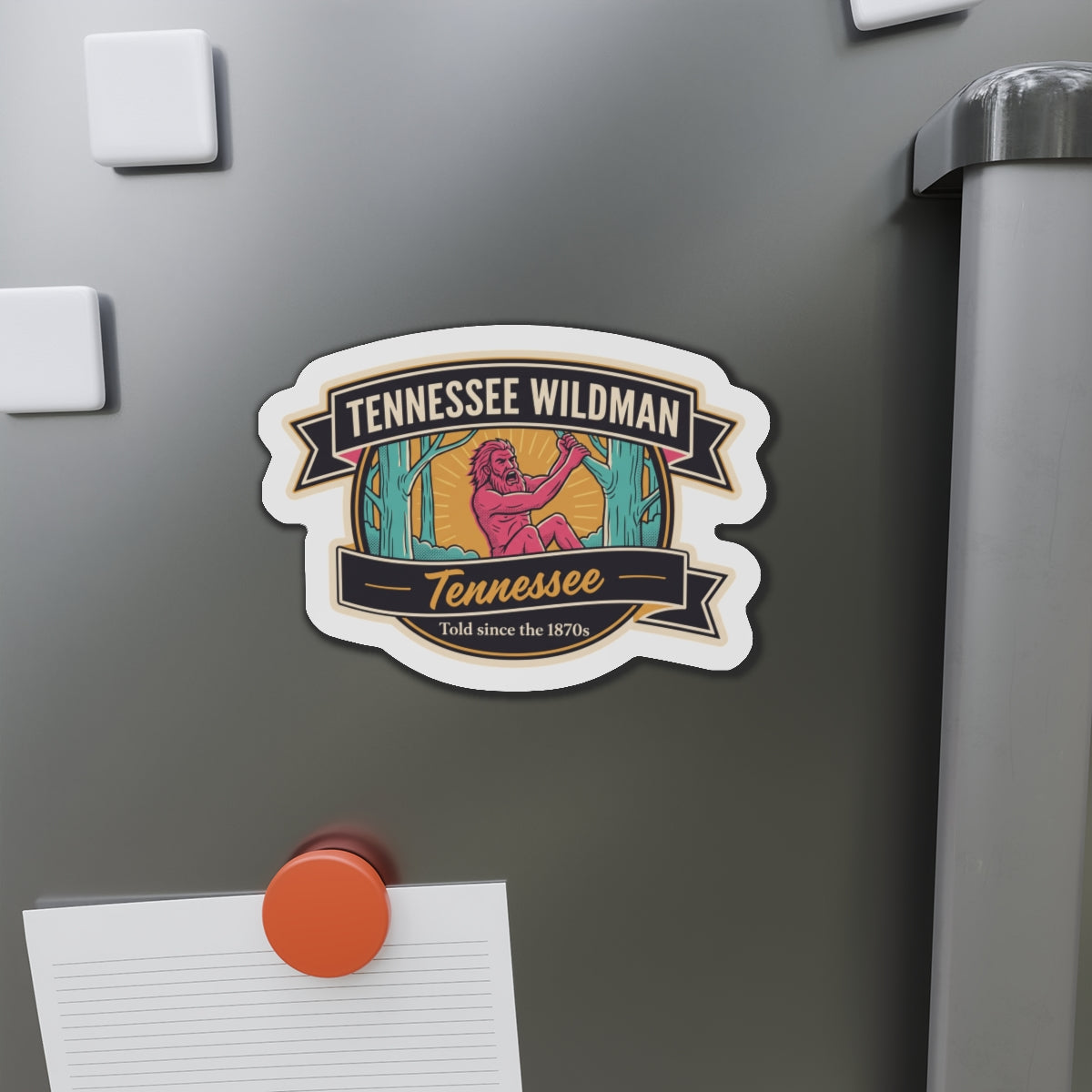 Tennessee Wildman die-cut magnet badge on matte gray refrigerator door