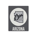 Dark gray metal wall art with white circle, Arizona cactus desert silhouette, “ARIZONA” text